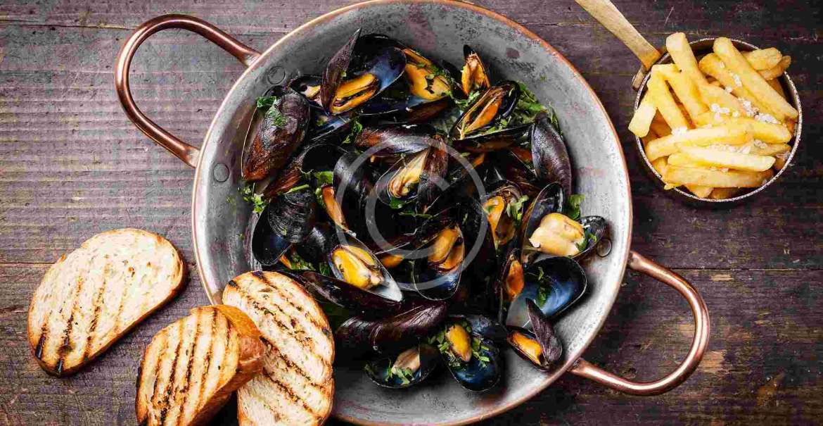 Thai-Style Mussels with Herbs and Coconut Broth